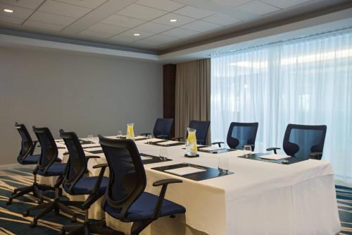 a conference room with a long table and chairs at Newport Marriott Hotel & Spa in Newport