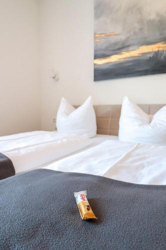 En eller flere senge i et værelse på Black Forest Hotel Kappel-Grafenhausen