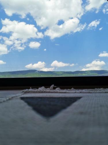 a view of the sky from the roof of a building at Stone Chalets - LUNA in Jajce