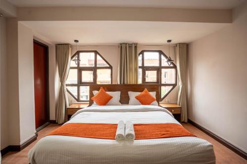 Postel nebo postele na pokoji v ubytování Hotel Pala
