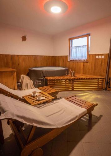 a hospital room with a bed and a window at Holiday home in Trebelno - Dolenjska & Bela krajina Unter- & Weißkrain 26032 in Trebelno