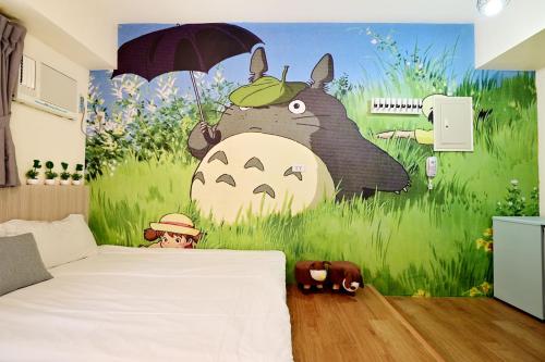 Una cama o camas en una habitación de Taichung FJ Victoria