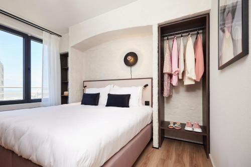 Postel nebo postele na pokoji v ubytování Rosa Hotel