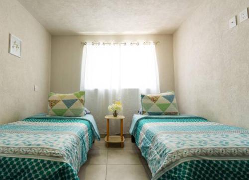 Katil atau katil-katil dalam bilik di Parques Guadalajara Department condominium, central, comfortable,