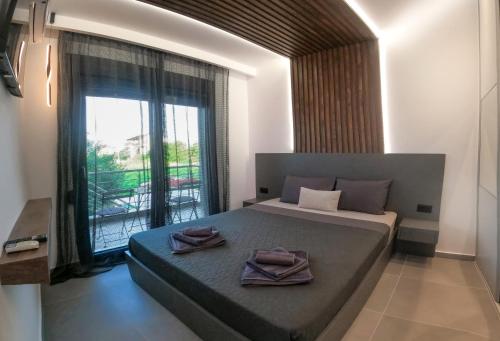 Säng eller sängar i ett rum på Berries Luxury Apartments