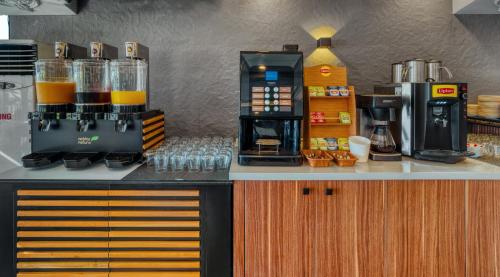 Příslušenství pro přípravu čaje a kávy v ubytování Numa Port Hotel