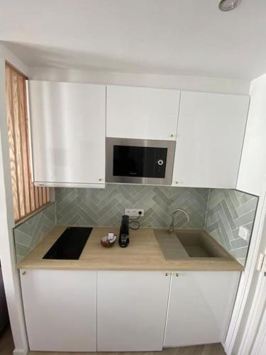 Photo de la galerie de l'établissement Studio au pied du Sacré-coeur, bail mobilité, à Paris