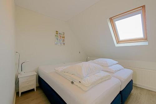 Postel nebo postele na pokoji v ubytování Vakantiehuis De Deining - Callantsoog