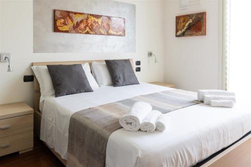 Säng eller sängar i ett rum på IseoLakeRental - Casa Marisol