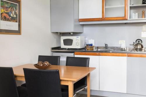 Dapur atau dapur kecil di Rosario Suites