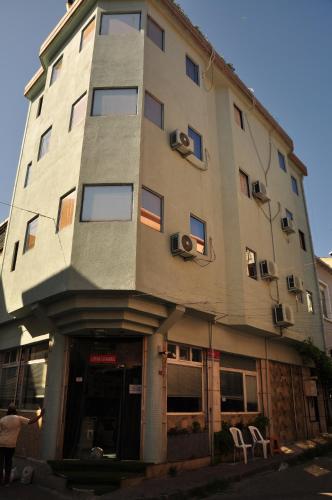 a tall building with windows on the side of it at Lotus Hotel in Istanbul