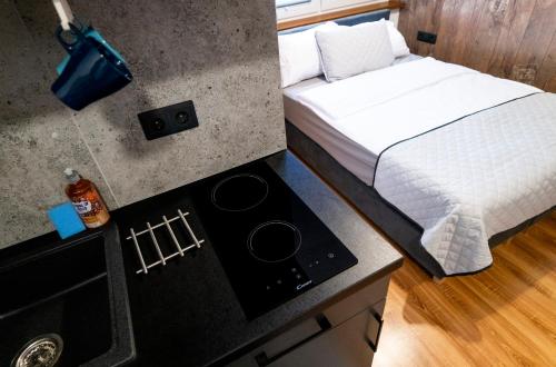 Postel nebo postele na pokoji v ubytování Aparthotel Krzywa