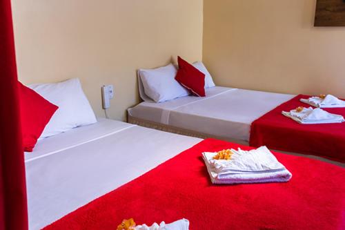 Hotel Mitologia Algodoalにあるベッド