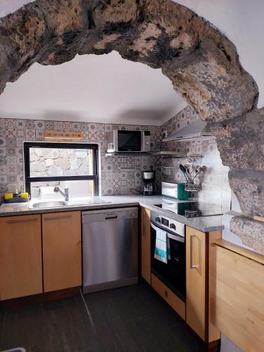 Dapur atau dapur kecil di Casas do Tareco