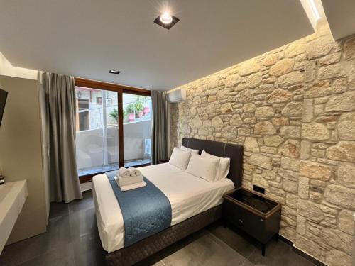 Postel nebo postele na pokoji v ubytování InLofts