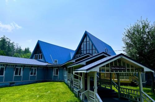 a large blue building with a sign on it at NewVida Preserve in Wilmington