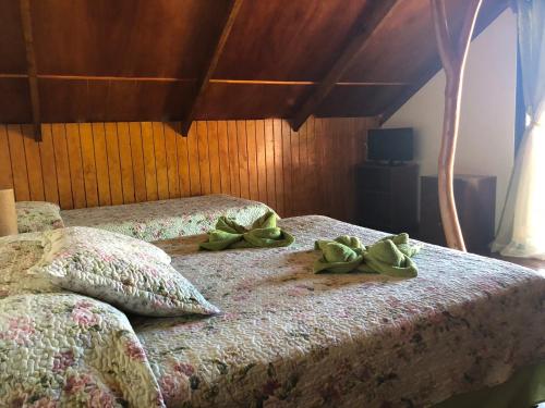 Voodi või voodid majutusasutuse Cabanas Hinariru Nui toas