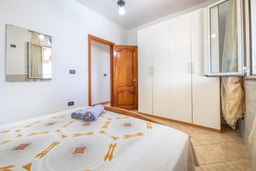 Ένα ή περισσότερα κρεβάτια σε δωμάτιο στο Villetta Balia