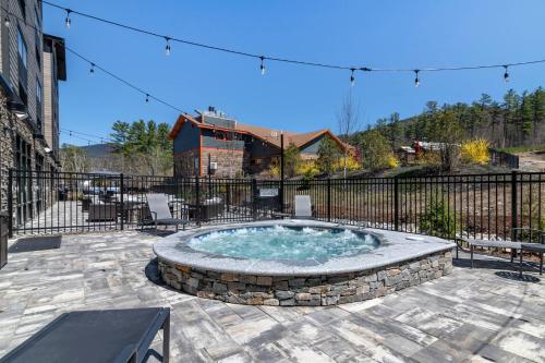 a hot tub in the middle of a patio at Fairfield by Marriott Inn & Suites North Conway in North Conway
