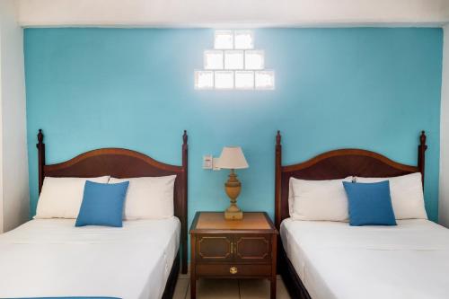Letto o letti in una camera di Hotel Pueblito Vallarta