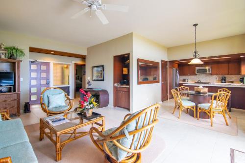 a living room with a couch and a table at Kapalua Villas Maui - Select Your Unit in Kahana