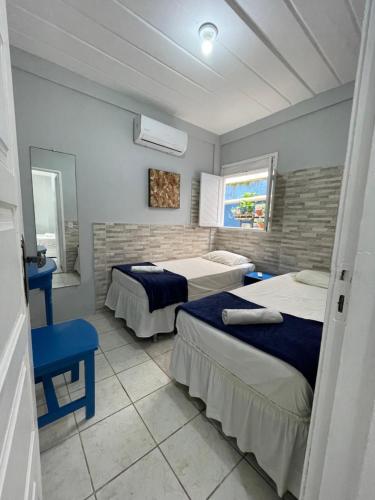 Postel nebo postele na pokoji v ubytování Pousada Girassol