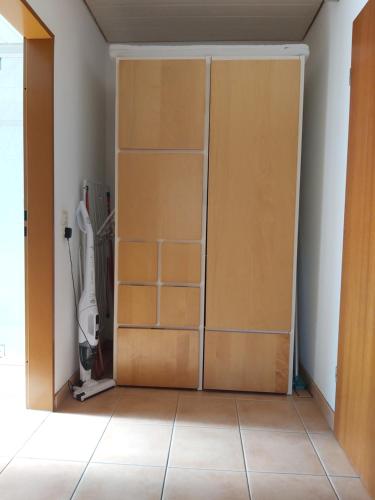 a room with a closet with a sliding door at Ferienwohnung im Molsbachtal in Happurg