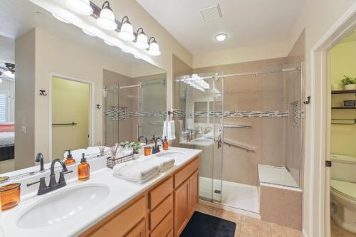 A bathroom at Modern Moreno Valley Oasis with Private Patio