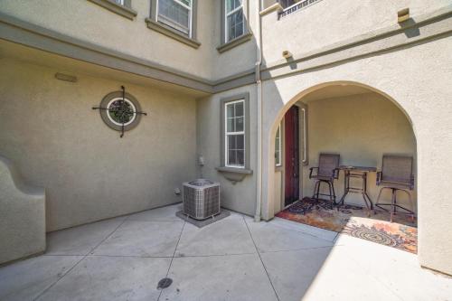 a room with a patio with a heater next to a building at Modern Moreno Valley Oasis with Private Patio in Moreno Valley