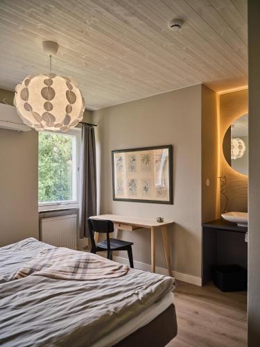 Ένα ή περισσότερα κρεβάτια σε δωμάτιο στο Herrestad Bed & Guestroom