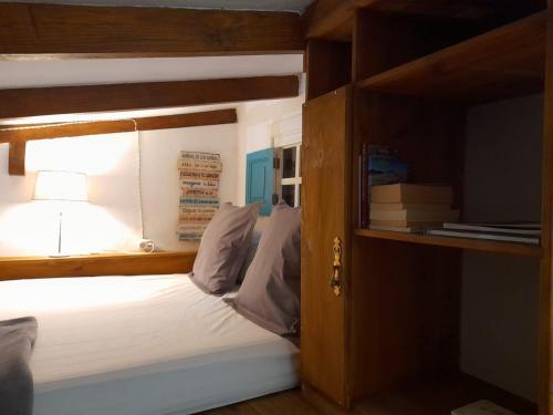 a bedroom with a bunk bed and a open door at La Finca in La Orotava