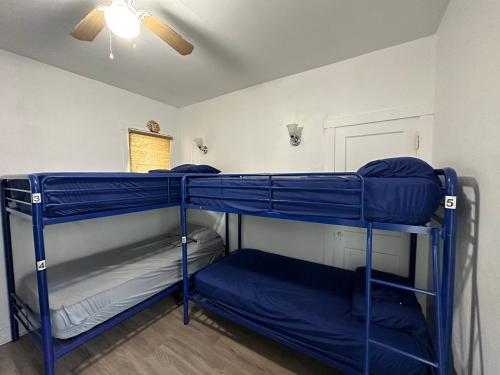 a room with two bunk beds in it at OQP Vacations Edgewater in Miami