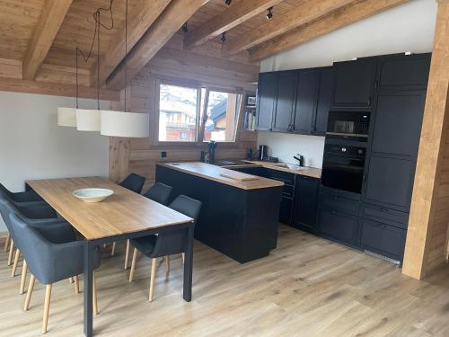 Kuchyň nebo kuchyňský kout v ubytování Chalet Tannegg