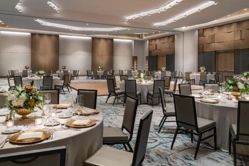 a large banquet room with tables and chairs at JW Marriott Clearwater Beach Resort & Spa in Clearwater Beach