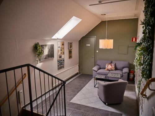 Χώρος καθιστικού στο Herrestad Bed & Guestroom