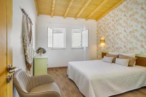 Posteľ alebo postele v izbe v ubytovaní Charming Amieira's Alqueva