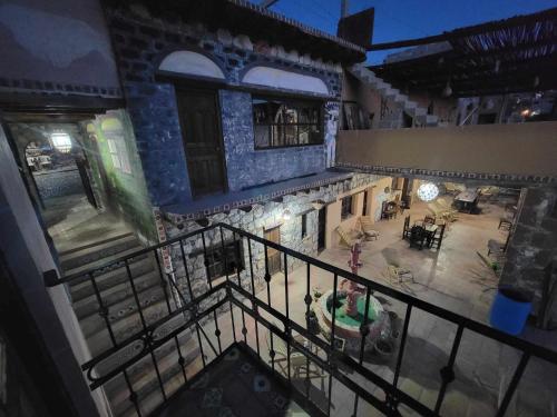 an overhead view of a building with a balcony at HOTEL RINCÓN MAGICO REAL DE CATORCE in Real de Catorce