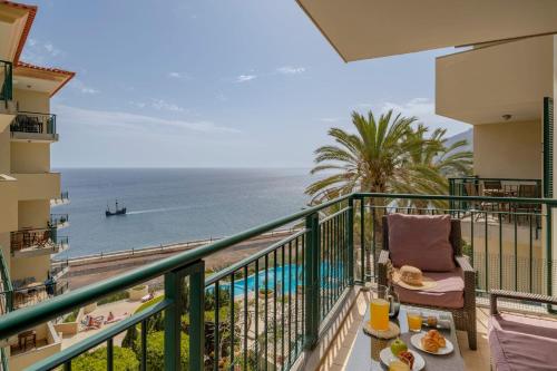 a balcony with a view of the ocean at Vila Formosa II by An Island Apart in Funchal