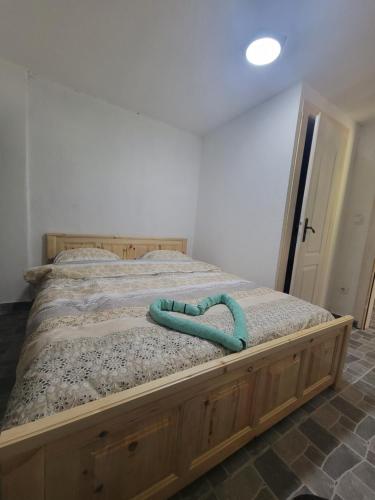 Postel nebo postele na pokoji v ubytování Etno selo skala