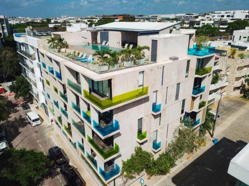 an overhead view of a building with plants on it at Apartamento en el corazón de Playa del Carmen, Sabor a Miel in Playa del Carmen