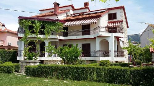 Apartments by the sea Palit, Rab - 15794