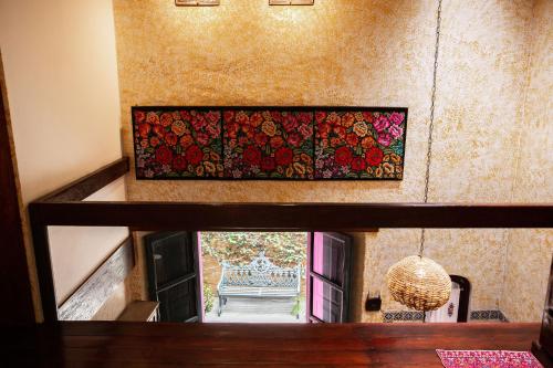 a view from the second floor of a house with a mosaic at Hotel Casa Pereyra in Oaxaca City