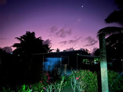 a house at night with a purple sky at Rangiriri Vacay Unit 1 in Amuri