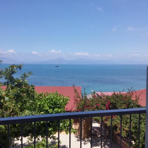 a view of the ocean from a balcony at Castella Beach in Alissos