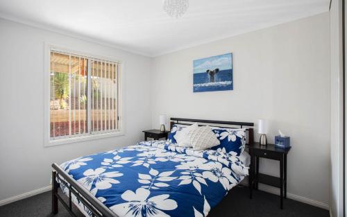 Una cama o camas en una habitación de Moet Escape in Style