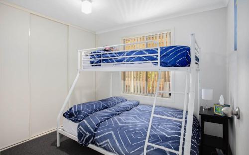 Una cama o camas en una habitación de Moet Escape in Style