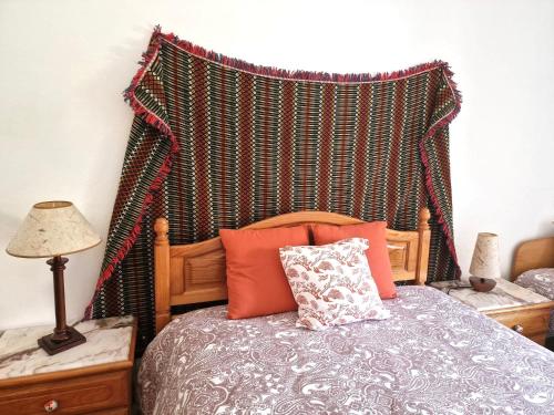 Postel nebo postele na pokoji v ubytování Herdade do Vendeiro