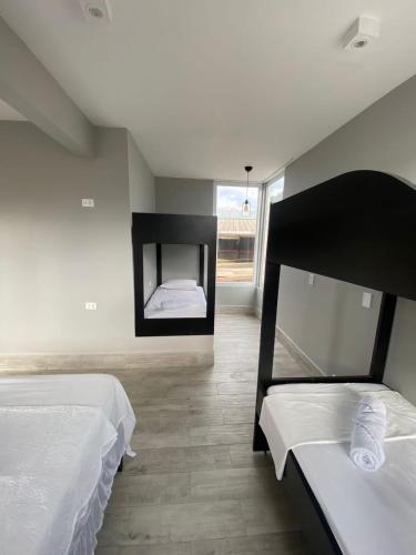 Ένα ή περισσότερα κρεβάτια σε δωμάτιο στο Enseada Beach Hotel