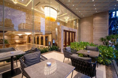 Zona de estar de Luxtery Hotel
