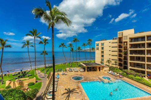 a view of the pool and beach at the resort at SUGAR BEACH RESORT, #326 condo in Kihei